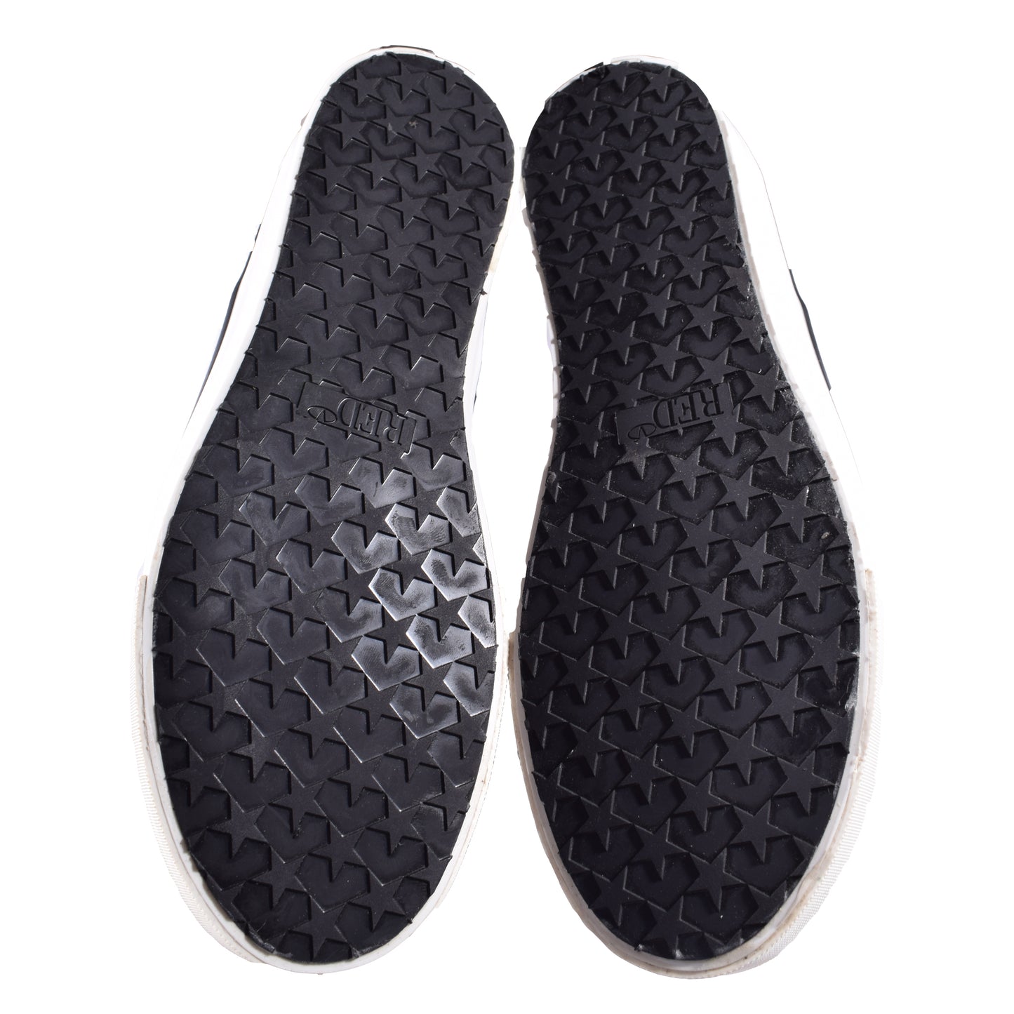 Red Valentino Slip-On Sneaker in weiß mit kunstvollem Druck aus Leder. Ansicht von unten Sohle mit Sternen